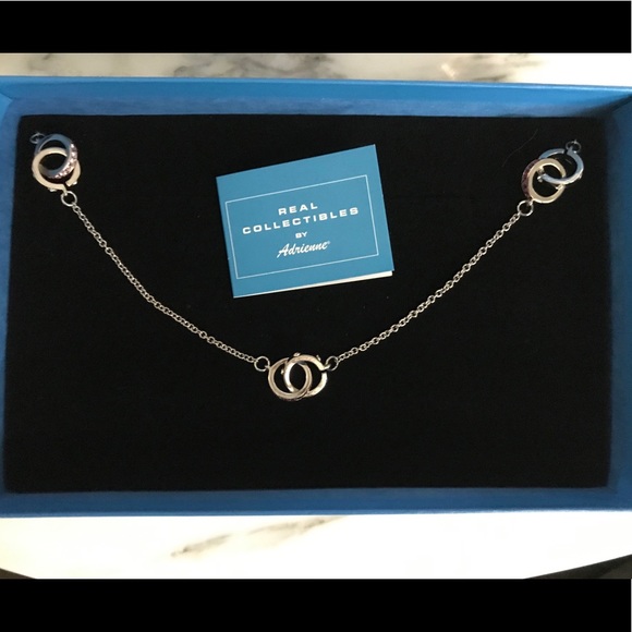 Real Collectibles by Adrienne interlocking rings - Picture 1 of 3